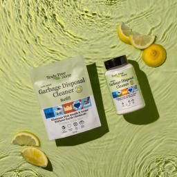 Truly Free Home Garbage Disposal Cleaner bottle and refill pack.
