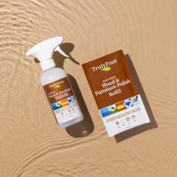 Truly Free Home Wood & Furniture Polish bottle and 1 refill pack.
