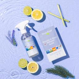 Truly Free Home Wrinkle & Static Releaser spray bottle and 1 refill pack.